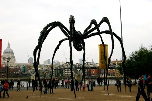 Londoners showing characteristic insouciance   & ignoring 40 foot tall spider...
